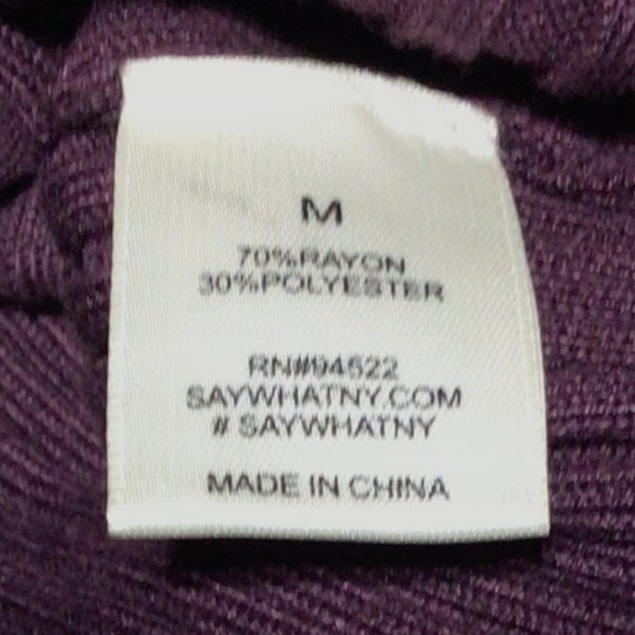 Purple dress below the knee with gold button detail on shoulder and up the leg. - Picture 5 of 6